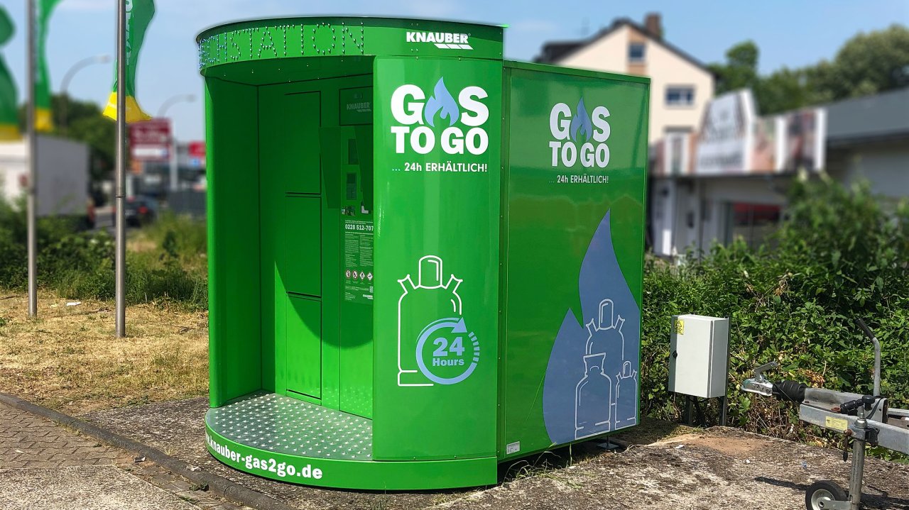 Grüne Knauber Gas to Go Tankstelle mit 24-Stunden-Verfügbarkeit für Gasflaschen.